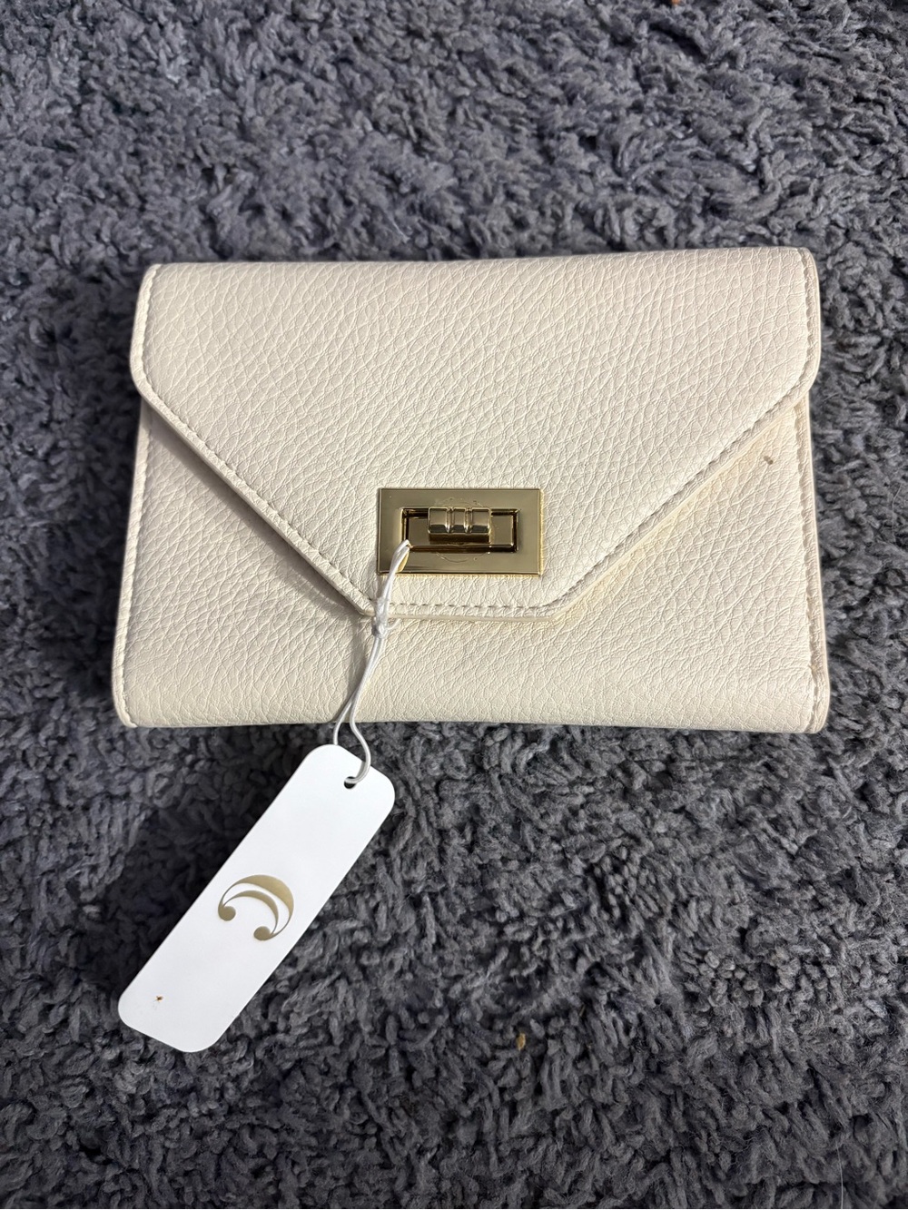 NWT Ivory golden clasped wallet